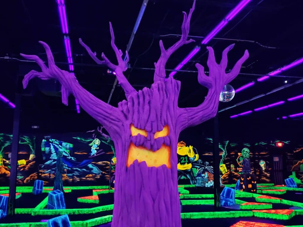 Glowing scary tree at monster mini golf