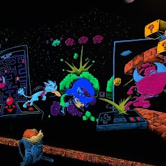 Lafayette, In 7 Glowing wall art at monster mini golf